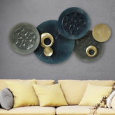 Artistic wall décor above wooden console table with indoor plants for home interior